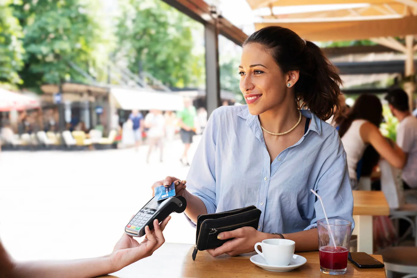 Woman making card payment