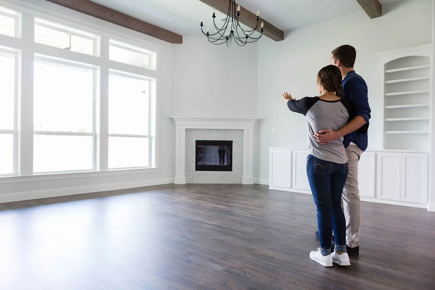 A couple inspecting their new home.