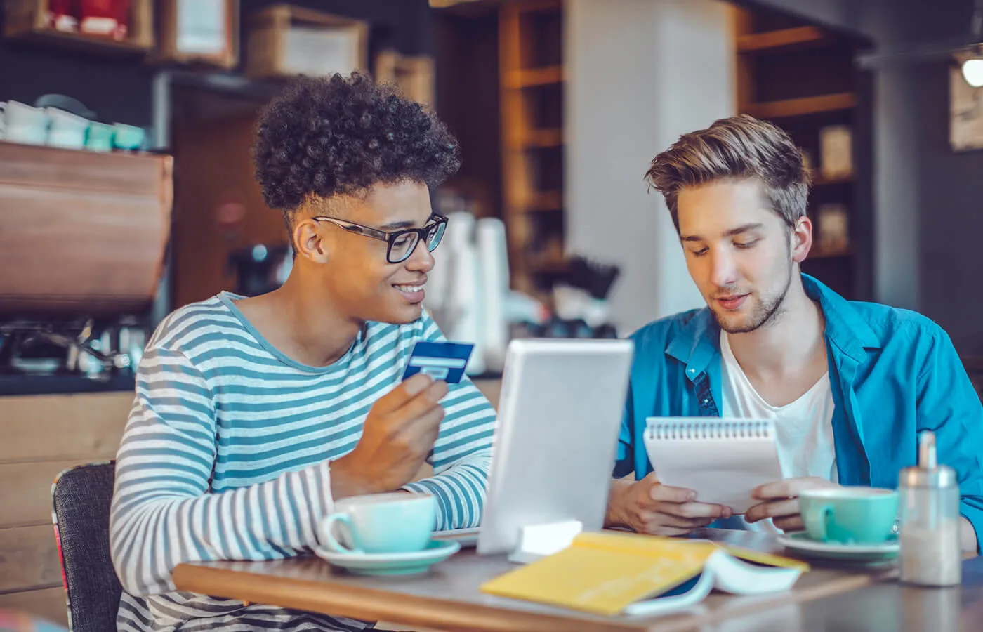 two young men planning out retirement savings