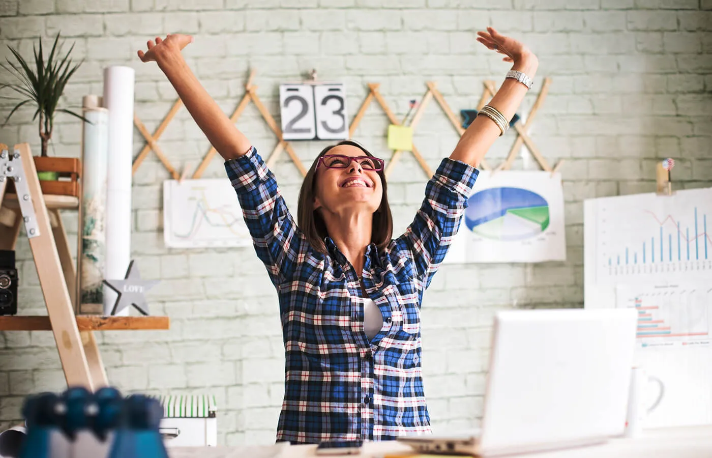 A smiling woman stretching her arms