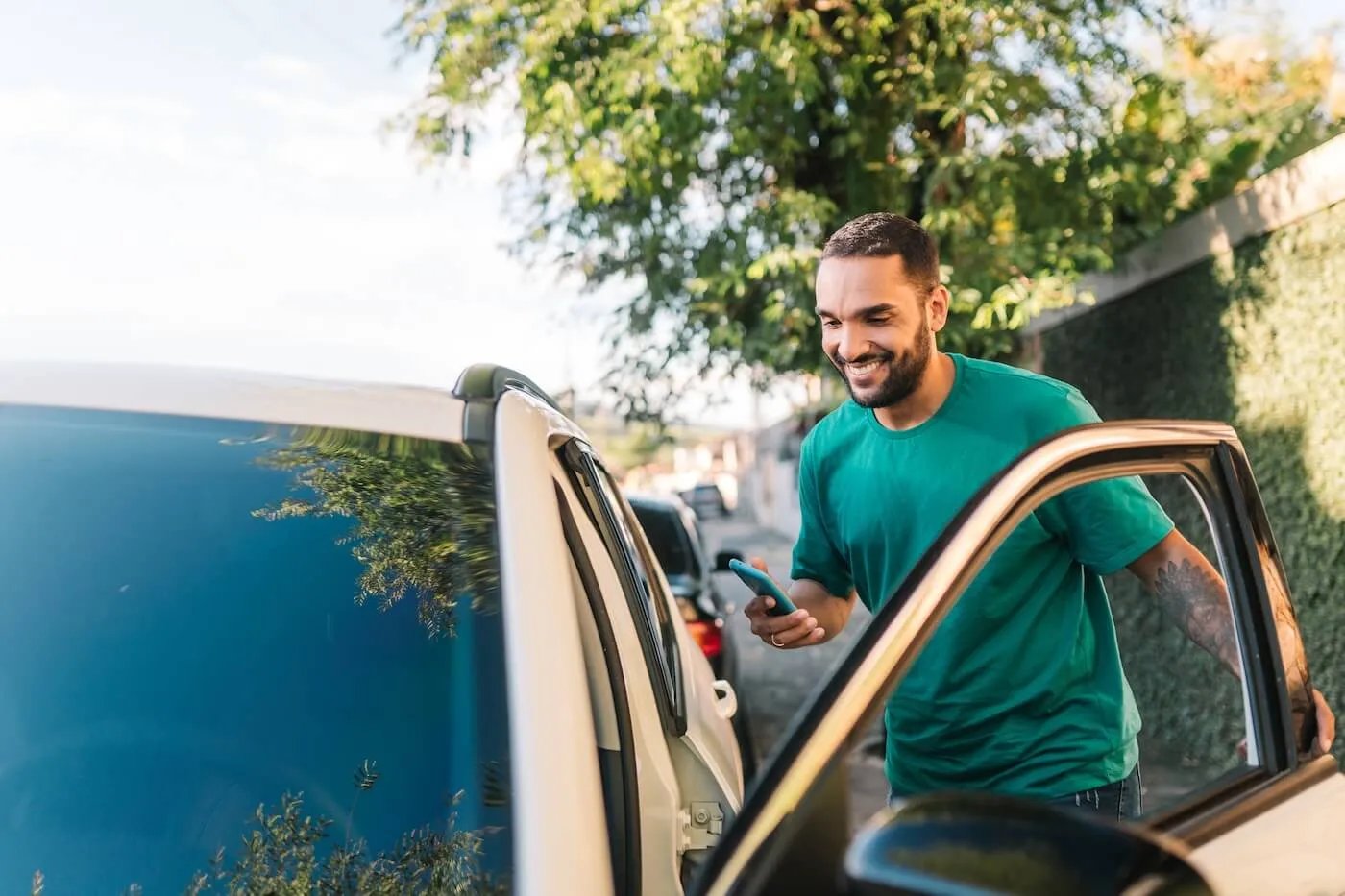 Man getting into the car to drive