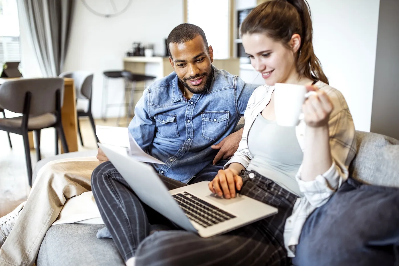 Young couple planning their finances together