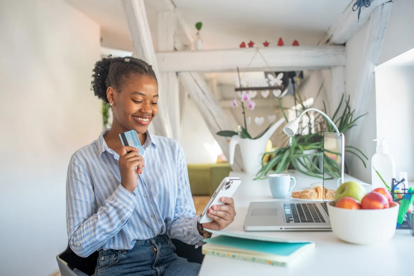 Woman shopping online with credit card