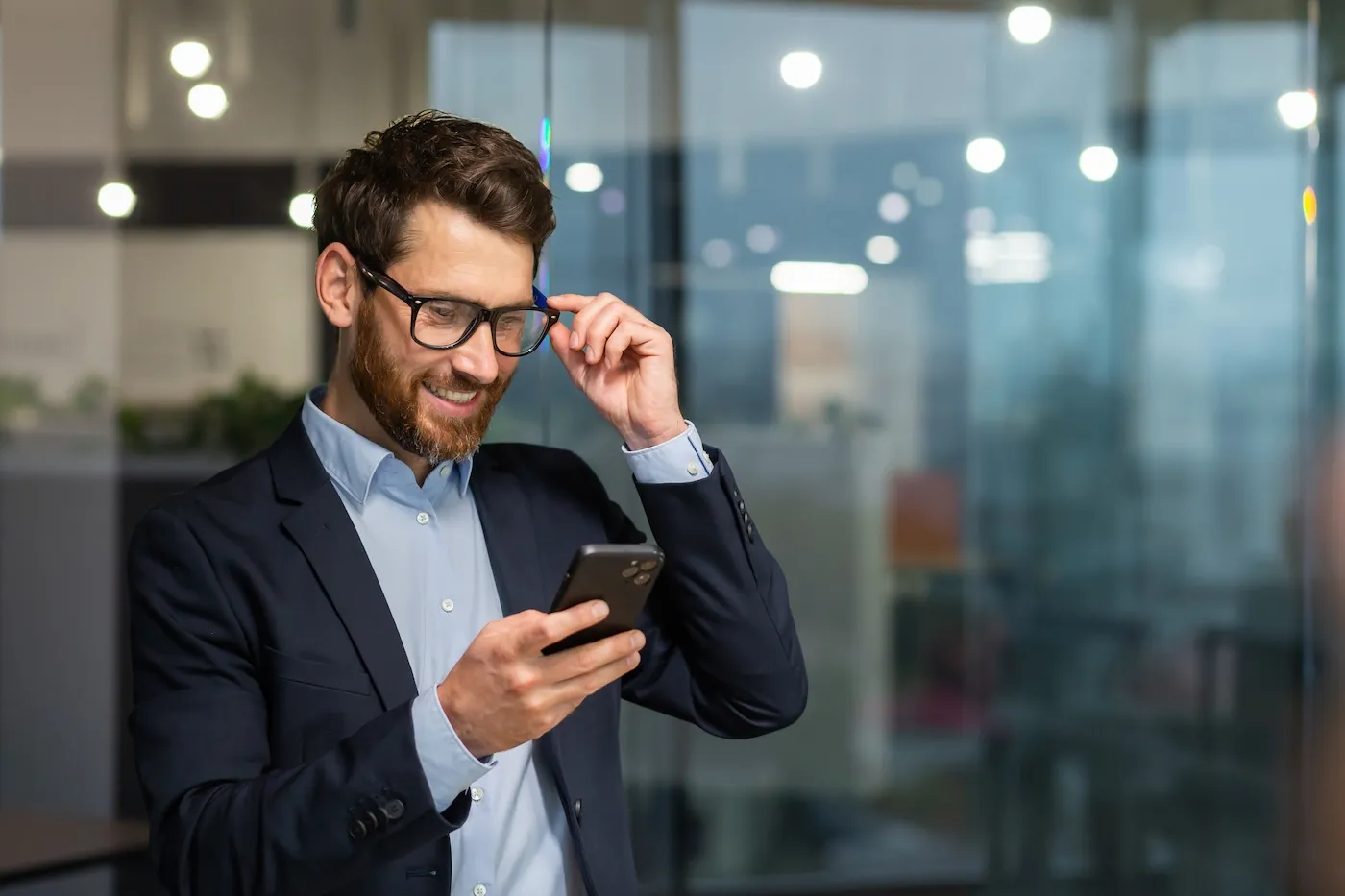 A man checking his bank account online from smartphone.