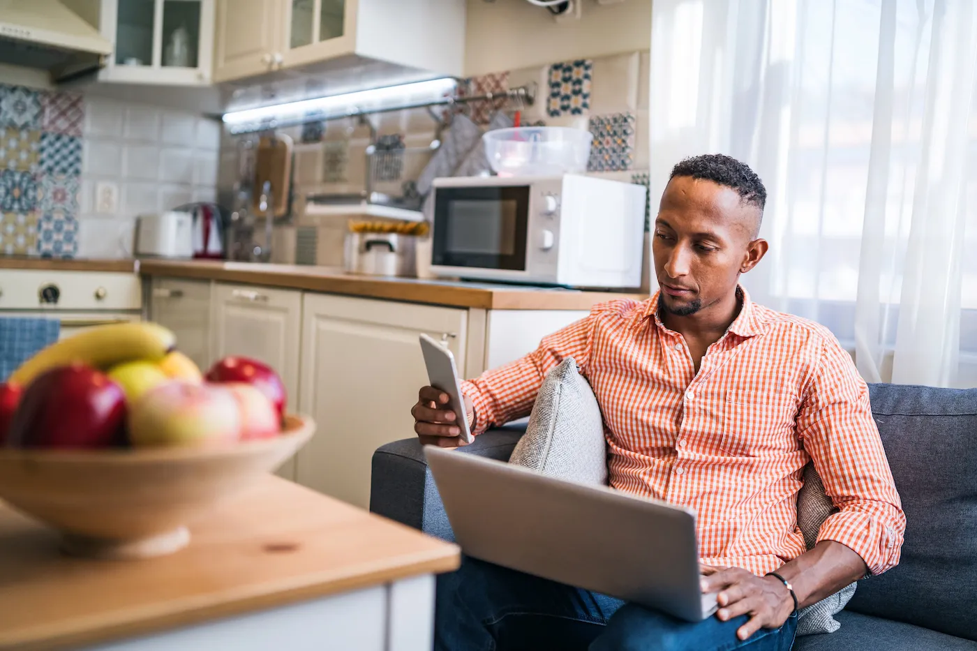 Young man working in his home office