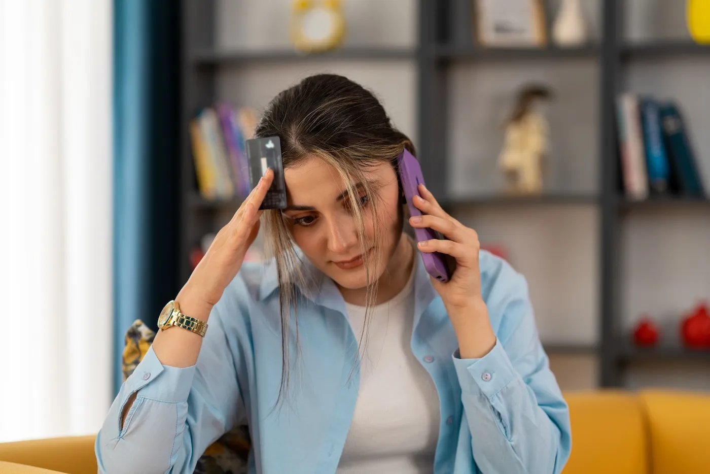 Worried woman call bank unable pay by card