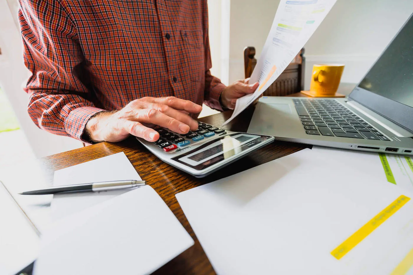 Man paying past due balances.