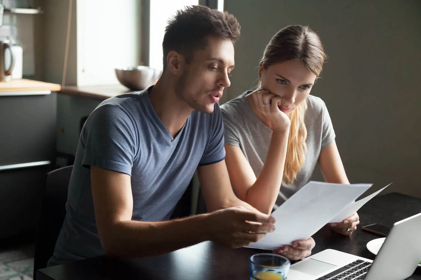 Newly married young couple deciding how to separate finances.