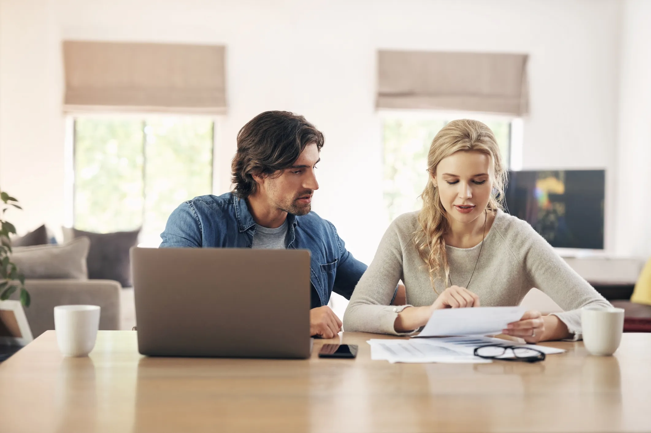 Couple reviewing their tax reports