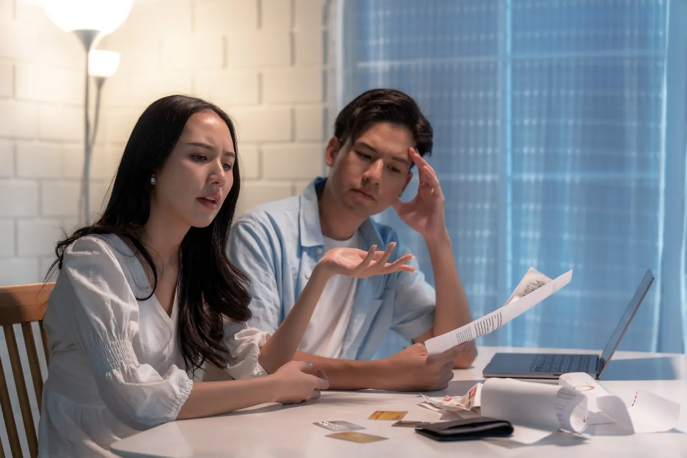 Stressed couple due to credit card hacking.