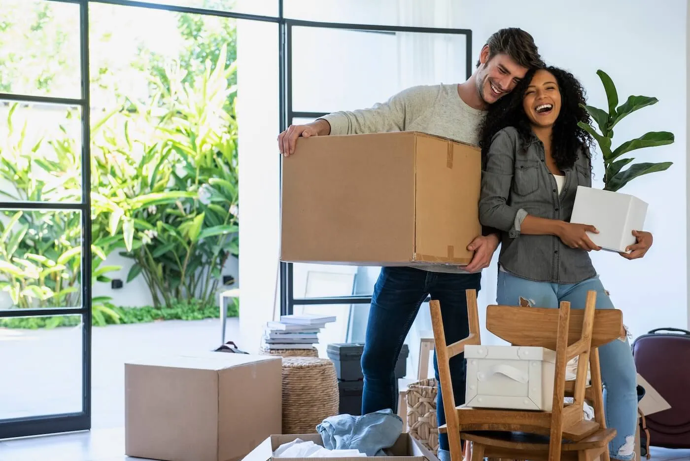 Young couple moving to their new home