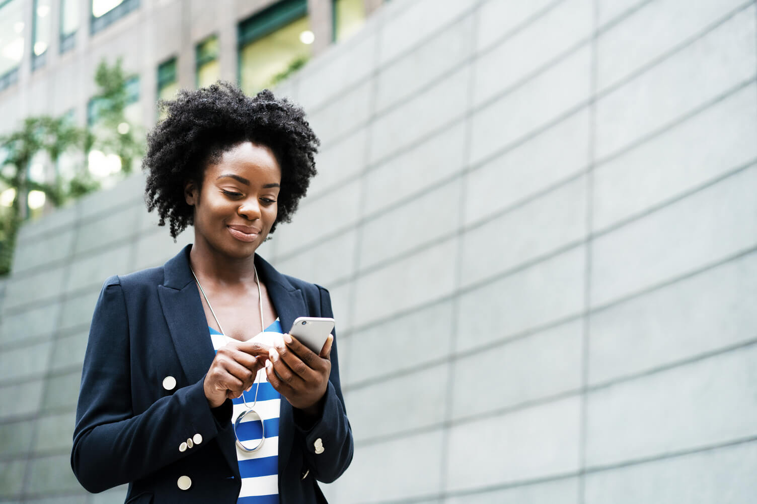 Business woman on her phone.