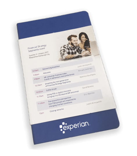 Event agenda printed and wrapped around a delegate notebook