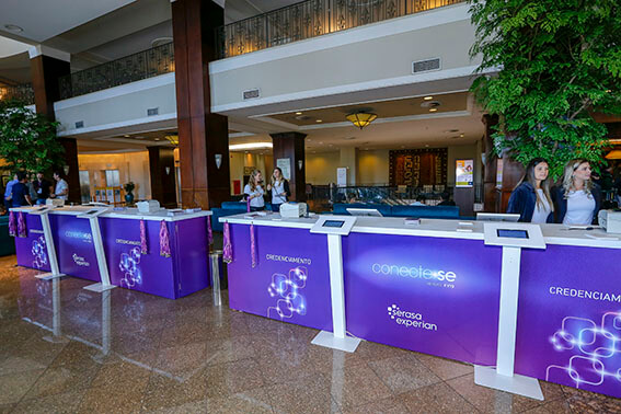 Experian branded purple counters for checking in guests