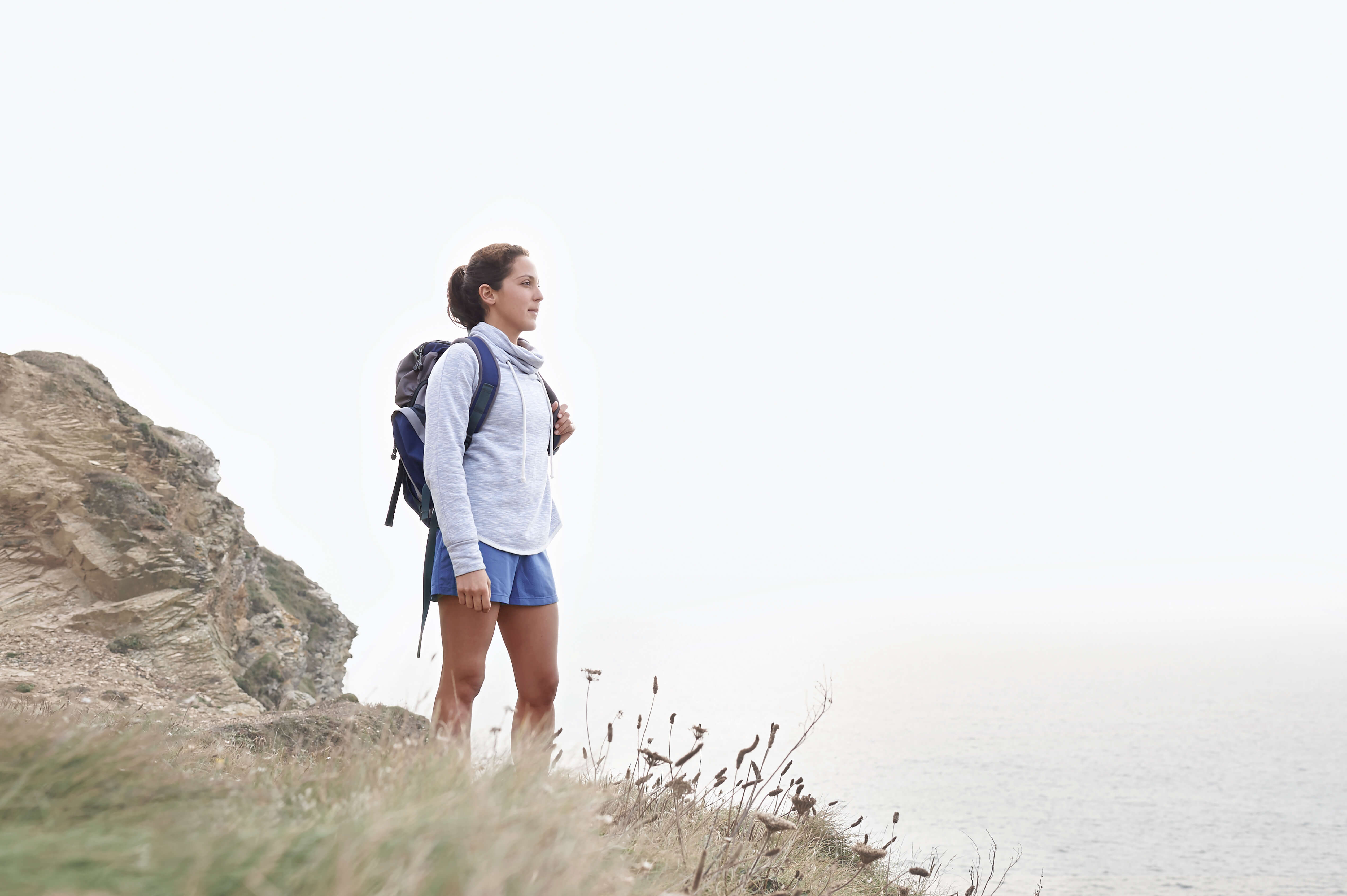 Female hiker looking out into an open space